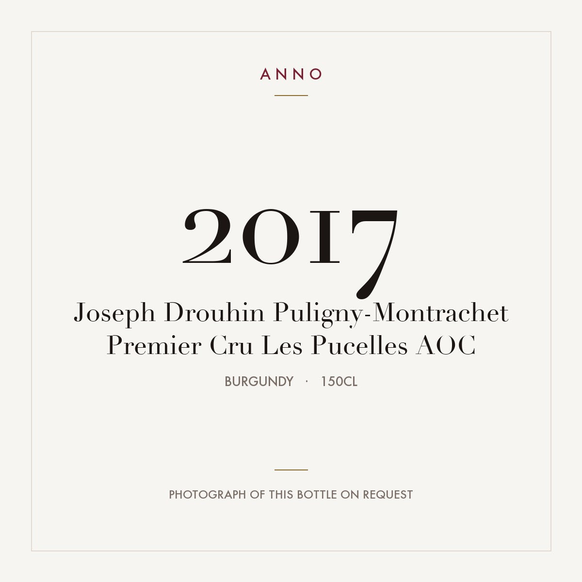 Joseph Drouhin Puligny-Montrachet Premier Cru Les Pucelles 2017 AOC 1,5l from Burgundy — ANNO vintage card; photograph of the actual bottle available on request
